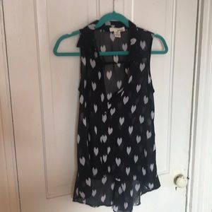 Black dress shirt with white hearts.